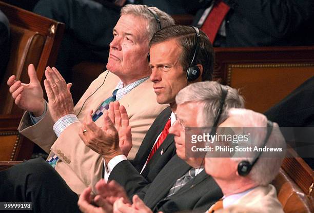 Senators Christopher S. "Kit" Bond, R-Mo., John Thune, R-Sd, Mike Enzi, R-Wyo, and Thad Cochran, R-Miss applaud Nuri al-Maliki, Prime Minister of...
