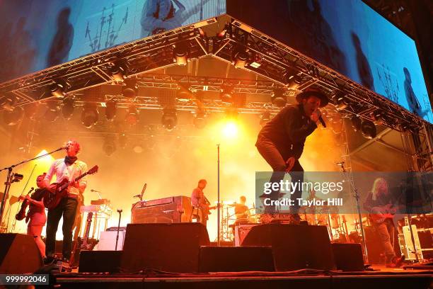 Sarah Neufeld, Richard Reed Parry, Win Butler, and Tim Kingsbury of Arcade Fire performs during the 2018 Forecastle Music Festival at Louisville...