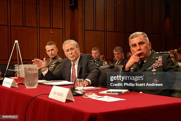 Secretary of Defense, Donald Rumsfeld, Chairman of the Joint Chiefs of Staff Gen. Peter Pace, Secretary of Defense, Donald Rumsfeld, and Army General...