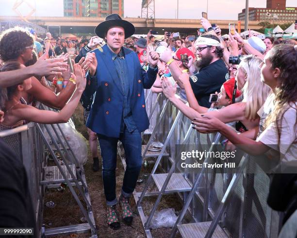 Win Butler of Arcade Fire performs marching through the crowd during the 2018 Forecastle Music Festival at Louisville Waterfront Park on July 15,...