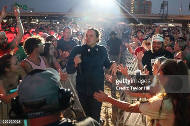 Win Butler of Arcade Fire performs marching through the crowd during the 2018 Forecastle Music Festival at Louisville Waterfront Park on July 15,...