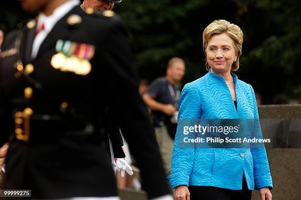 Sen. Hillary Clinton D-Ny. Walks to her seat during the Marine Corps "Sunset Parade" in front of the Iwo Jima memorial. Sen. Clinton was the Guest of...