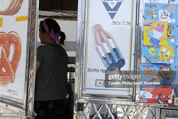 Street vendor sells ice cream and soda's on the corner of 16th St.. And F St.. NW. Temperatures in Washington D.C. Are expected to climb to around...