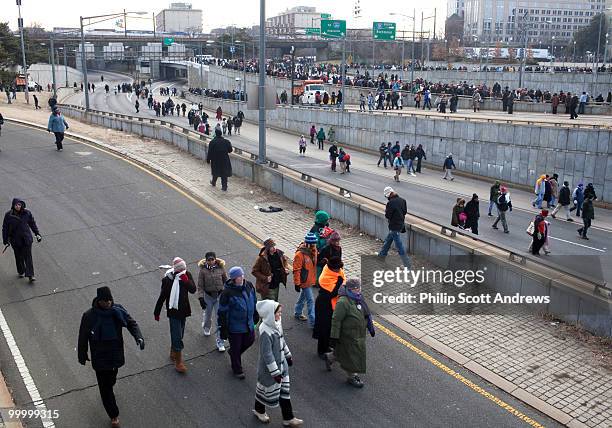 Crowds looking for an exit stream into the Interstate 395 tunnel south of the U.S. Capitol.