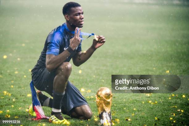 Paul Pogba of France celebrates with the trophy during the World Cup Final match between France and Croatia at Luzhniki Stadium on July 15, 2018 in...