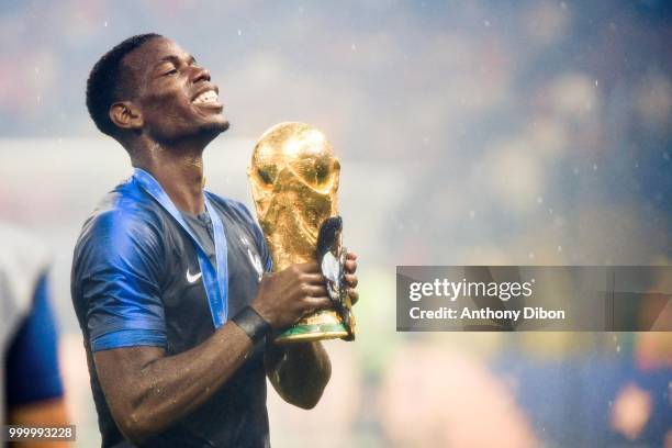 Paul Pogba of France celebrates with the trophy during the World Cup Final match between France and Croatia at Luzhniki Stadium on July 15, 2018 in...