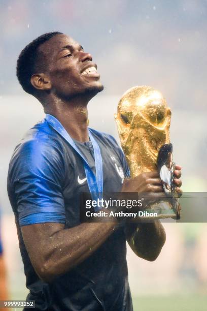 Paul Pogba of France celebrates with the trophy during the World Cup Final match between France and Croatia at Luzhniki Stadium on July 15, 2018 in...