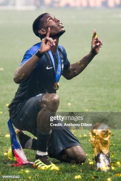 Paul Pogba of France celebrates with the trophy during the World Cup Final match between France and Croatia at Luzhniki Stadium on July 15, 2018 in...