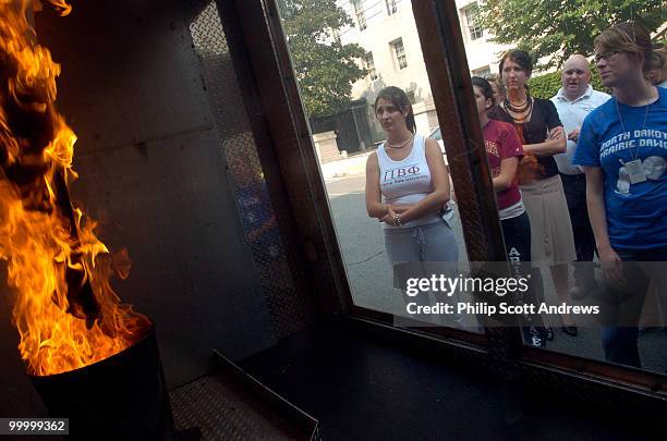 Capitol Hill interns learn about fire safety during a controled burn on Capitol Hill.