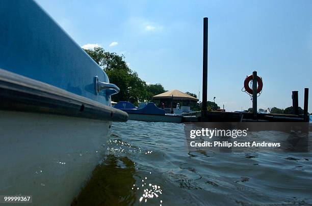 Luis Denavides paddles a paddle boat around the Jefferson Memorial tidal basin. The boats are available for rent across the basin from the memorial...