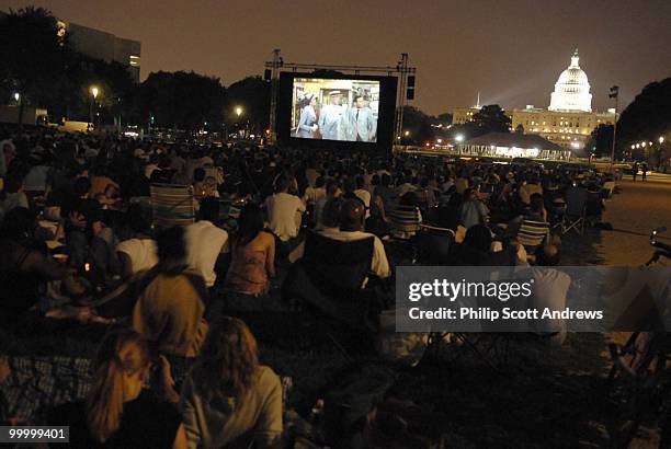 An audience gathers on the mall Screen on the Green, a summer movie series on Monday nights at sunset on the National Mall.