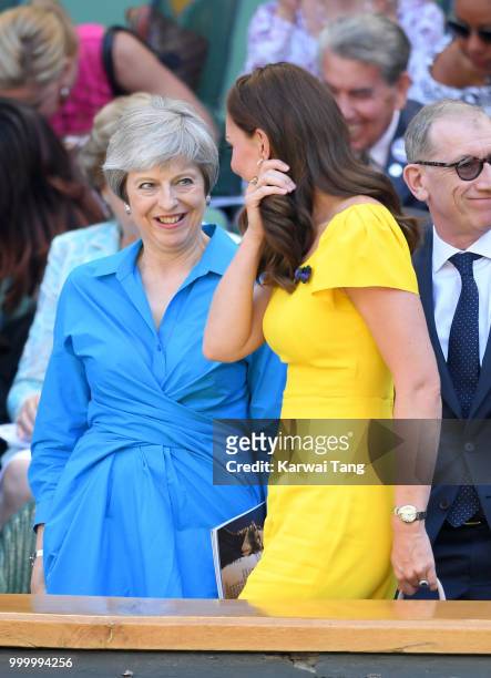 Theresa May and Catherine, Duchess of Cambridge attend the men's single final on day thirteen of the Wimbledon Tennis Championships at the All...