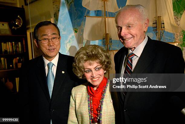 Rep. Tom Lantos, D- Ca, and his wife Annette pose for pictures with United Nations Secretary General Ban Ki-moon during a luncheon in Lantos' office...