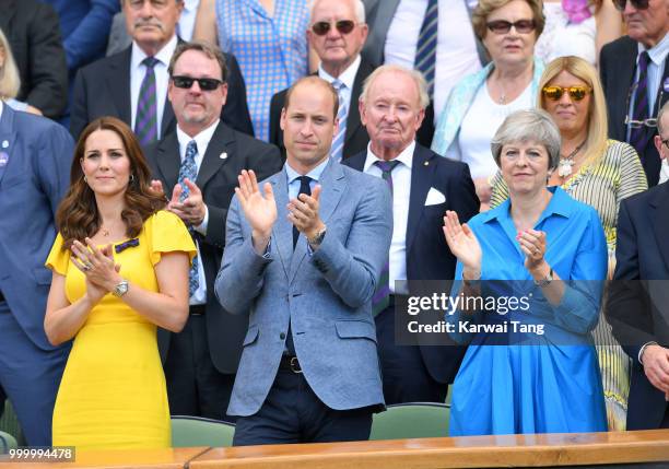 Catherine, Duchess of Cambridge, Prince William, Duke of Cambridge and Prime Minister Theresa May attend the men's single final on day thirteen of...