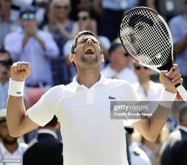 Novak Djokovic of Serbia celebrates after defeating Kevin Anderson of South Africa in the Wimbledon men's singles final in London on July 15, 2018....