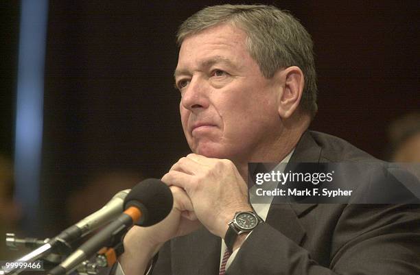 Before a full committee meeting on Tuesday, Attorney General John Ashcroft awaits questioning before giving the committee his "5 Steps to Success"...