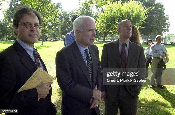 Senator John McCain awaits the arrival of Sen. Ernest F. Hollings , Sen. Ron Wyden and Sen. Max Cleland , before a press conference on airline safety...