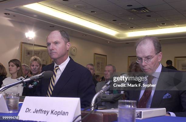 Witnessess James Caruso, deputy assistant director, Counter-terrorism for the FBI and Dr. Jeffery Koplan, director, CDC , seat themselves before...