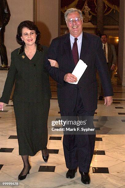 House Majority Leader, Dick Armey walks with his wife, Susan, into the House Chamber before announceing his retirement on Wednesday.