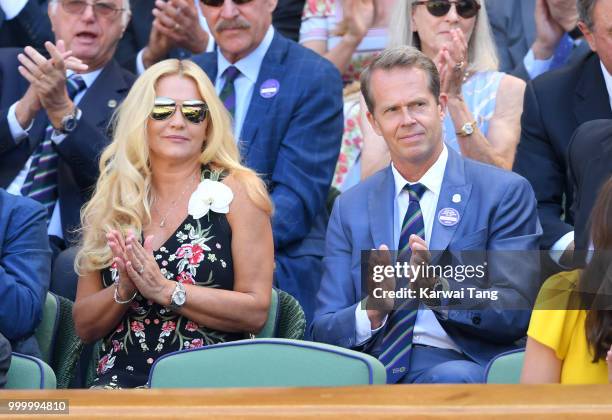 Annette Hjort Olsen and Stefan Edberg attend the men's single final on day thirteen of the Wimbledon Tennis Championships at the All England Lawn...