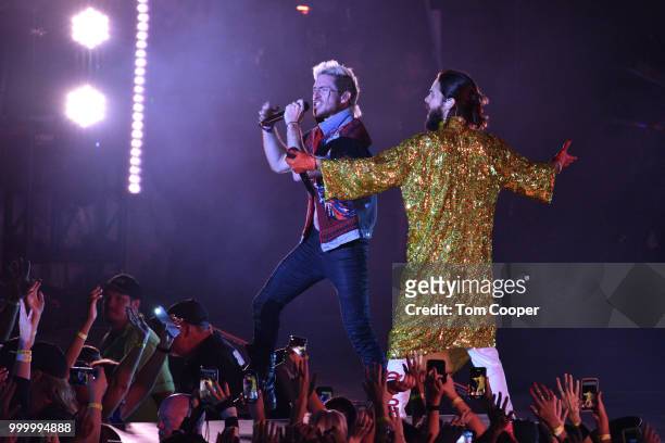 Lead singer of Walk the Moon performs with Jared Leto of Thirty Seconds to Mars at the Channel 93.3 Big Gig concert at Fiddler's Green Amphitheatre...