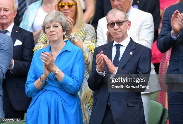 Prime Minister Theresa May and Philip May attend the men's single final on day thirteen of the Wimbledon Tennis Championships at the All England Lawn...