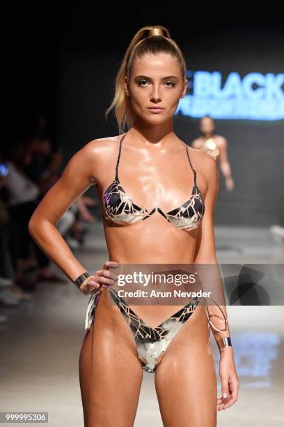 Model walks the runway for Black Tape Project at Miami Swim Week powered by Art Hearts Fashion Swim/Resort 2018/19 at Faena Forum on July 15, 2018 in...