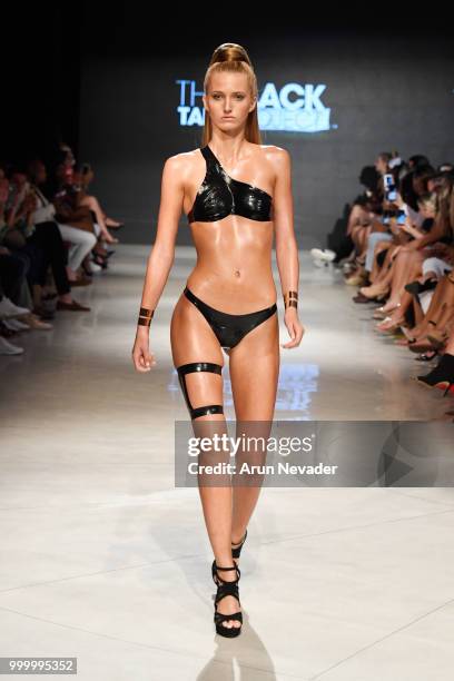 Model walks the runway for Black Tape Project at Miami Swim Week powered by Art Hearts Fashion Swim/Resort 2018/19 at Faena Forum on July 15, 2018 in...