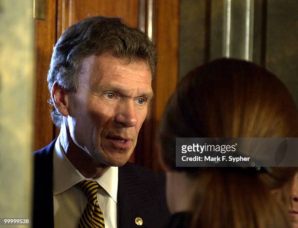 Senate Minority Leader Tom Daschle , answers questions before retreating back to is office on Wednesday. Daschle promised to use both hard and soft...