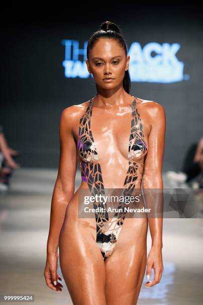 Model walks the runway for Black Tape Project at Miami Swim Week powered by Art Hearts Fashion Swim/Resort 2018/19 at Faena Forum on July 15, 2018 in...