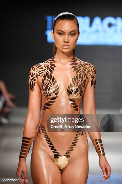 Model walks the runway for Black Tape Project at Miami Swim Week powered by Art Hearts Fashion Swim/Resort 2018/19 at Faena Forum on July 15, 2018 in...