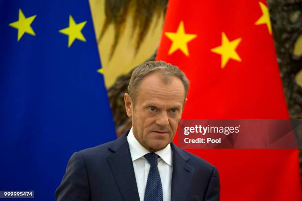 European Council President Donald Tusk attends a joint press conference with European Commission President Jean-Claude Juncker attends and Chinese...