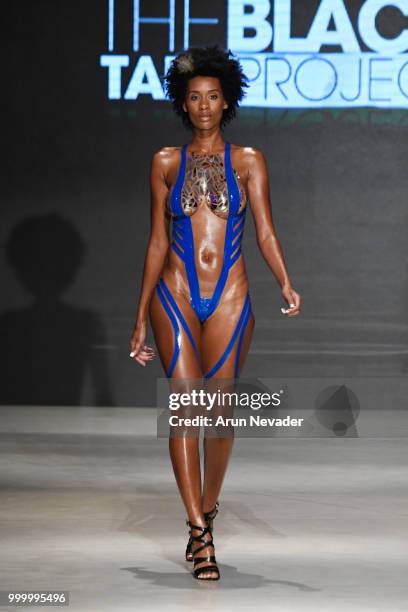 Model walks the runway for Black Tape Project at Miami Swim Week powered by Art Hearts Fashion Swim/Resort 2018/19 at Faena Forum on July 15, 2018 in...