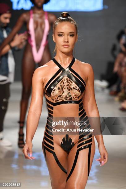 Model walks the runway for Black Tape Project at Miami Swim Week powered by Art Hearts Fashion Swim/Resort 2018/19 at Faena Forum on July 15, 2018 in...