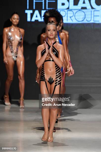 Models walk the runway for Black Tape Project at Miami Swim Week powered by Art Hearts Fashion Swim/Resort 2018/19 at Faena Forum on July 15, 2018 in...