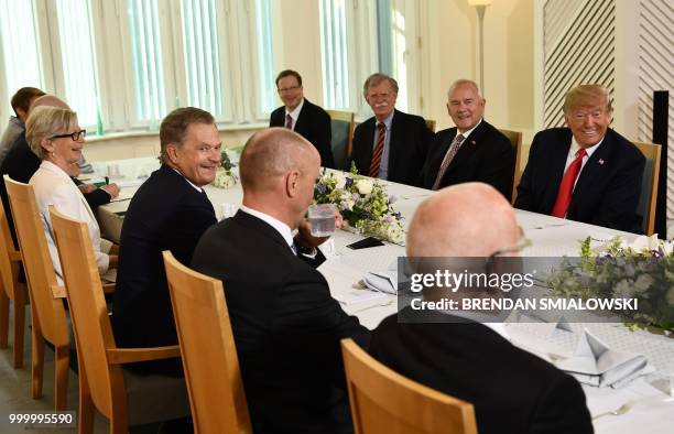 President Donald Trump and Finnish President Sauli Niinisto meet for talks at the Mantyniemi Presidential Residence in Helsinki, on July 16, 2018. -...