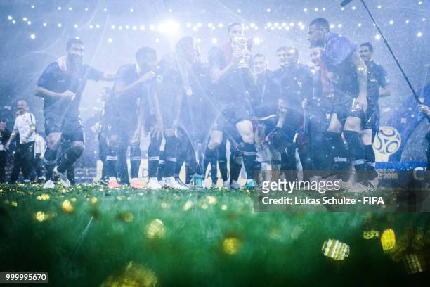 Team France celebrate after winning the 2018 FIFA World Cup Russia Final between France and Croatia at Luzhniki Stadium on July 15, 2018 in Moscow,...
