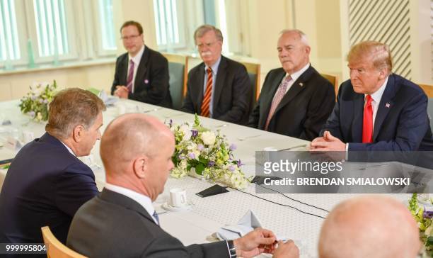 President Donald Trump and Finnish President Sauli Niinisto meet for talks at the Mantyniemi Presidential Residence in Helsinki, on July 16, 2018. -...