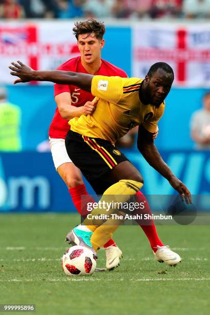 Romelu Lukaku of Belgium controls the ball under pressure of John Stones of England during the FIFA 2018 World Cup Russia Play-off for third place...