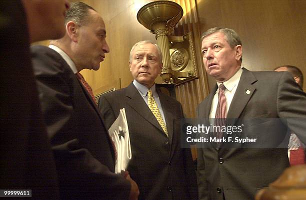 Before a full committee meeting on Tuesday, Senators Charles E. Schumer , Orrin G. Hatch and Attorney General John Ashcroft have a moment to...