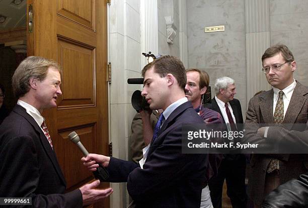 Senator Lincoln Chafee talks to a reporters after crossing party lines and declaring that he doen't support arctic refuge drilling in Alaska.