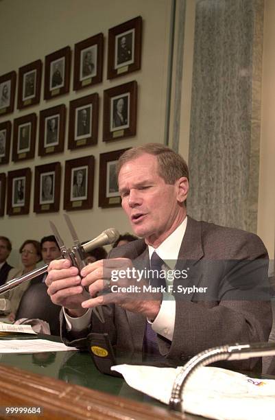 Senator Bill Nelson displays a utility tool, with blades out, that along with a box cutter identical to the one used by terrorist that hijacked four...