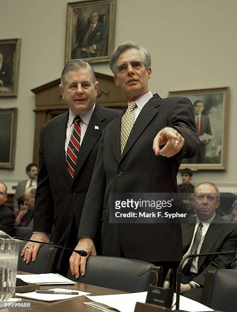 Kenneth Mead, right, imspector general, Transportation Department, jokes with a congressman before testifying. To his right is John Magaw, under...