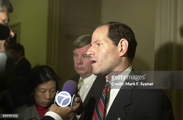 Eliot Spitzer, Attorney General NY, addresses media in the Longworth Building on Thursday, after testifying. Spitzer feels that charitable...