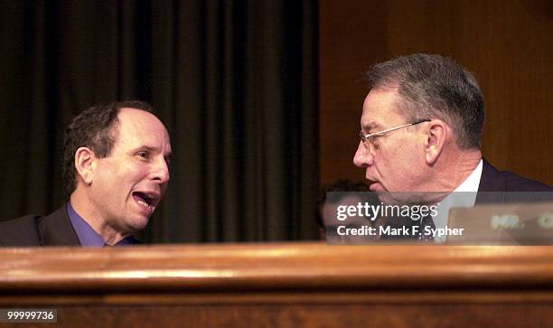 Senator's Paul Wellstone , left, and Charles E. Grassley share a moment during the full committee hearing on the nomination of Thomas Dorr, to be...