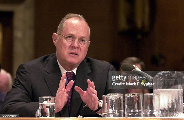 Supreme Court Associate Justice Anthony Kennedy describes to Sen. Ernest F. Hollings the proposed budget, during a Commerce, Justice, State and the...