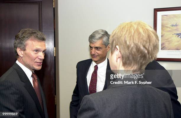 Senate Majority Leader, Thomas Daschle greets former Treasury Secretary Robert Rubin, former Chief of Staff Leon E. Panetta and Maureen S....