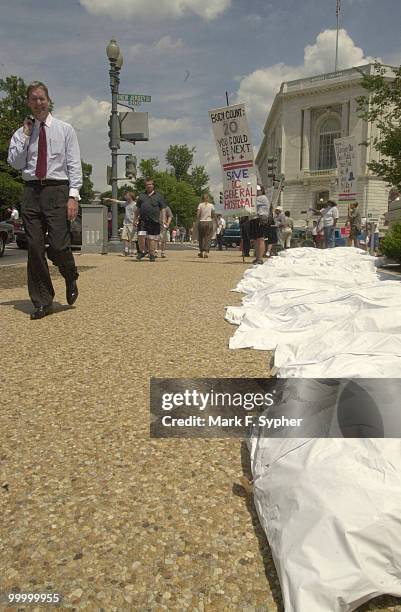 Demonstrators outside of the Longworth building Thursday afternoon who are part of the D.C. Coalition to Save D.C. General Hospital layed out 20...