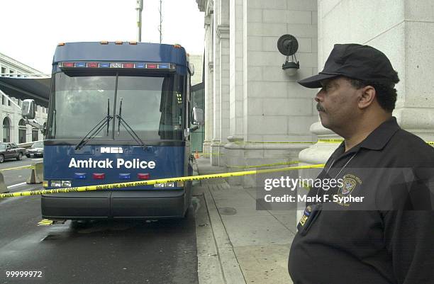 Amtrak's Chief of Patrol, Lonnie Bennett, stands post before the afternoon rush hour and congressional activity that will be taking place this...