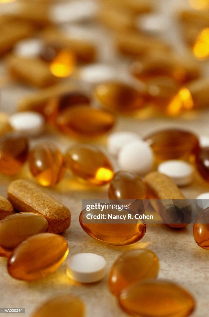 Close-up of Vitamin E, D and B Pills